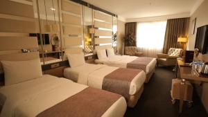 A bed or beds in a room at REFORM OTEl