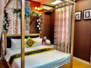 Voodi või voodid majutusasutuse Phuong Dong hotel toas