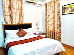 Voodi või voodid majutusasutuse Phuong Dong hotel toas