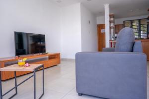 TV a/nebo společenská místnost v ubytování Kolibri Holiday Apartments