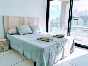 Posteľ alebo postele v izbe v ubytovaní Valentino golf penthouse bloque 2 no46