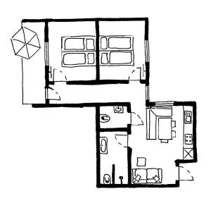 a black and white floor plan of a house at Gästehaus Erika in Schladming