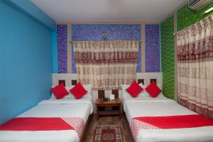 Ένα ή περισσότερα κρεβάτια σε δωμάτιο στο Hotel Middle Point Pvt Ltd