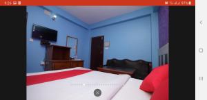 Ένα ή περισσότερα κρεβάτια σε δωμάτιο στο Hotel Middle Point Pvt Ltd