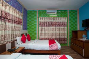 Ένα ή περισσότερα κρεβάτια σε δωμάτιο στο Hotel Middle Point Pvt Ltd
