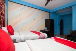 Ένα ή περισσότερα κρεβάτια σε δωμάτιο στο Hotel Middle Point Pvt Ltd