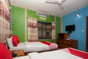 Ένα ή περισσότερα κρεβάτια σε δωμάτιο στο Hotel Middle Point Pvt Ltd