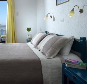 Postel nebo postele na pokoji v ubytování Victoria Hotel