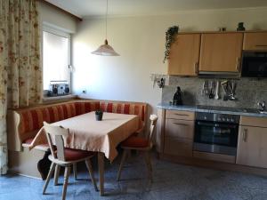 Kuchyň nebo kuchyňský kout v ubytování Appartement Etschbacher