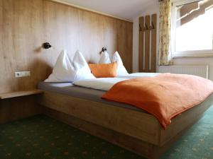 Voodi või voodid majutusasutuse Etschbacher toas