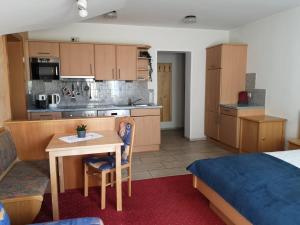 Kuchyň nebo kuchyňský kout v ubytování Appartement Etschbacher