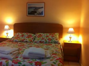 Katil atau katil-katil dalam bilik di Hotel CostaFósil