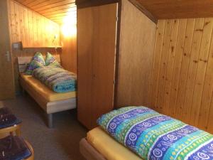 Postel nebo postele na pokoji v ubytování Chalet Marder