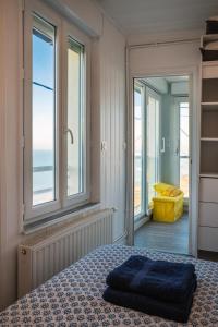 Postel nebo postele na pokoji v ubytování La tête Ault - Une expérience unique en bord de Mer
