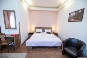 Posteľ alebo postele v izbe v ubytovaní Hotel Džbán