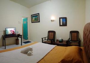 Letto o letti in una camera di Backpacker Kawah Ijen