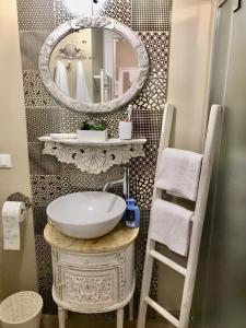 Kúpeľňa v ubytovaní Castelvecchio Loft + 28 fotografií