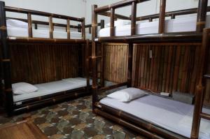 Letto o letti in una camera di Backpacker Kawah Ijen