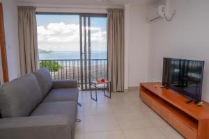 TV a/nebo společenská místnost v ubytování Kolibri Holiday Apartments