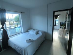 Letto o letti in una camera di Apartamentos Sweet Island