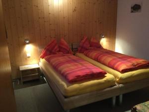 Postel nebo postele na pokoji v ubytování Chalet Marder
