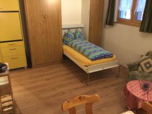 
Ein Bett oder Betten in einem Zimmer der Unterkunft Chalet Marder
