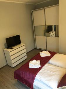 Posteľ alebo postele v izbe v ubytovaní Baltic Blue Apartamenty Pobierowo