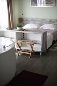 Posteľ alebo postele v izbe v ubytovaní Zagreb Camp Bungalows