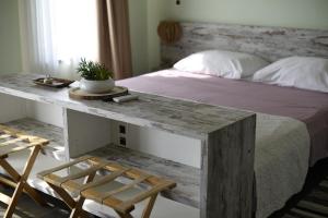 Posteľ alebo postele v izbe v ubytovaní Zagreb Camp Bungalows