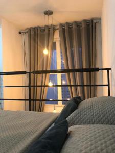 Кровать или кровати в номере Loft Duplex Impression Morumbi