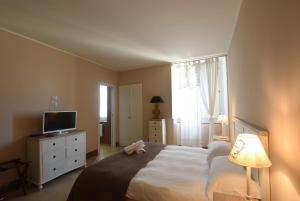 Letto o letti in una camera di Borgo del Carato
