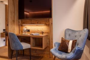 Kuchyň nebo kuchyňský kout v ubytování Silvana Mountain Hotel