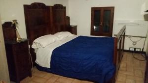 Postel nebo postele na pokoji v ubytování B&B Villa Storica Calderino