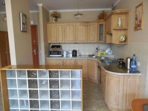 Kuchyňa alebo kuchynka v ubytovaní Apartament Familijny Beskidzki + 7 fotografií