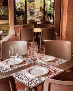 A restaurant or other place to eat at Alto da Pousa
