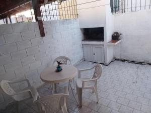 Μια τηλεόραση ή/και κέντρο ψυχαγωγίας στο Casa en Las Toninas Buenos Aires