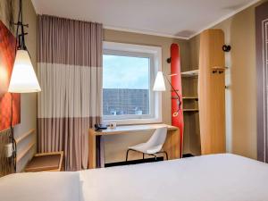 Postel nebo postele na pokoji v ubytování Ibis Münster City