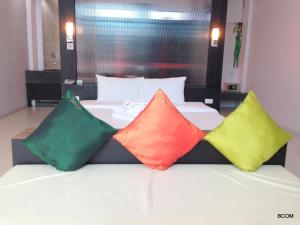 Ένα ή περισσότερα κρεβάτια σε δωμάτιο στο Khun Chaweng Resort