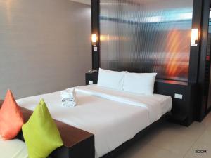 Postel nebo postele na pokoji v ubytování Khun Chaweng Resort