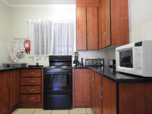 Kuchyň nebo kuchyňský kout v ubytování Mosselbos Self Catering
