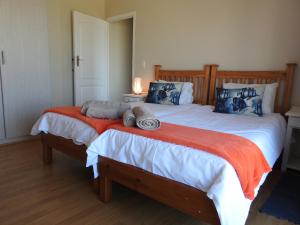 Postel nebo postele na pokoji v ubytování Mosselbos Self Catering