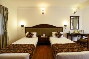 Letto o letti in una camera di Park Village Resort by KGH Group