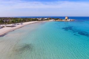 an aerial view of a beach and the ocean at Masseria San Vito in Copertino