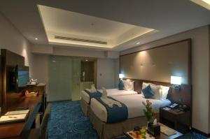 Katil atau katil-katil dalam bilik di Ramee Dream Resort