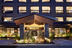 a rendering of the front of a hotel at Mercure Kyoto Station in Kyoto