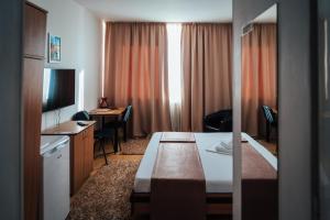 En eller flere senger på et rom på HOTEL K2 CITY