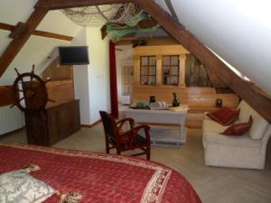 Posezení v ubytování Les Chambres de Pontfol - Chambres d'hôtes - Guest house + 21 fotografií