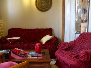 Posezení v ubytování Les Chambres de Pontfol - Chambres d'hôtes - Guest house