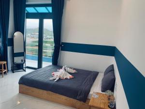 Postel nebo postele na pokoji v ubytování November Villa Đà Lạt