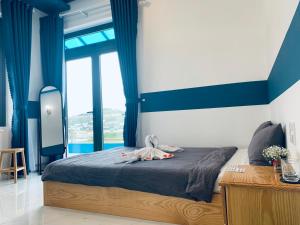 Postel nebo postele na pokoji v ubytování November Villa Đà Lạt